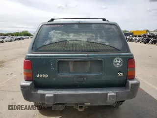 1993 Jeep Grand Cherokee Laredo with VIN 1J4GZ58Y8PC513026, listed as a Copart auction lot 57001465 with 135,242 mi miles and Clean title. Bid and sale history available at DreamBid. Image 6.