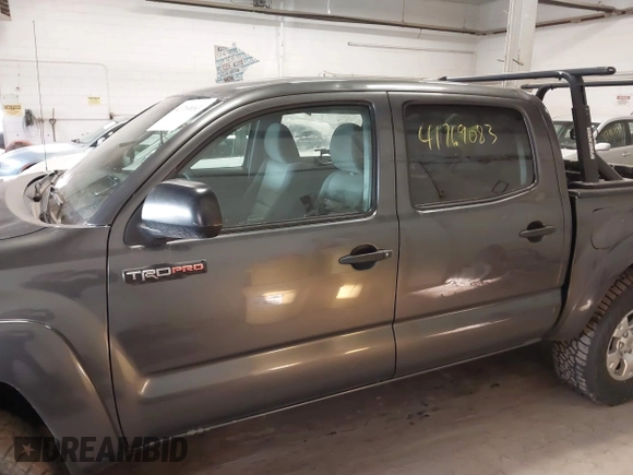 2014 Toyota Tacoma with VIN 3TMLU4EN3EM151917, listed as a IAAI auction lot 41769083 with 216,910 mi miles. Bid and sale history available at carsss.com. Image 14.