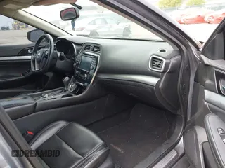 2018 Nissan Maxima SV with VIN 1N4AA6AP4JC377985, listed as a IAAI auction lot 42071678 with 104,326 mi miles and . Bid and sale history available at DreamBid. Image 5.