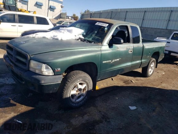 1999 Dodge Dakota SLT with VIN 1B7GG22X0XS239398, listed as a Copart auction lot 80143414 with 147,646 mi miles and Salvage Title. Bid and sale history available at DreamBid. Image 1.