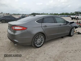2014 Ford Fusion SE Hybrid with VIN 3FA6P0LU8ER343625, listed as a Copart auction lot 54844285 with 181,631 mi miles and Salvage Title. Bid and sale history available at DreamBid. Image 3.