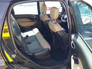 2014 FIAT 500L Lounge z VIN ZFBCFACH7EZ005656, wystawiony jako IAAI lot #42264765 z przebiegiem 88 021 mil mil oraz . Historia ofert i sprzedaży dostępna na DreamBid. Obrazek 8.