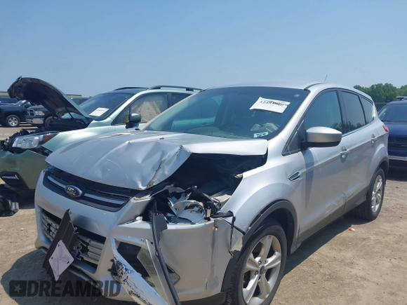 2014 Ford Escape SE with VIN 1FMCU9GX3EUC42964, listed as a IAAI auction lot 42484080 with 124,696 mi miles and . Bid and sale history available at DreamBid. Image 6.