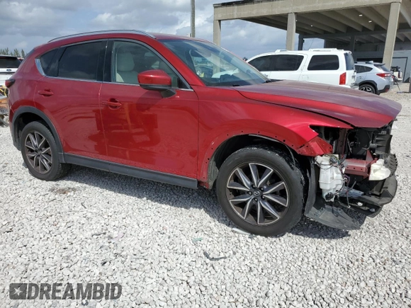 2018 Mazda CX-5 Grand Touring with VIN JM3KFADM7J0399895, listed as a Copart auction lot 47598265 with 0 mi miles and Salvage Title. Bid and sale history available at carsss.com. Image 4.