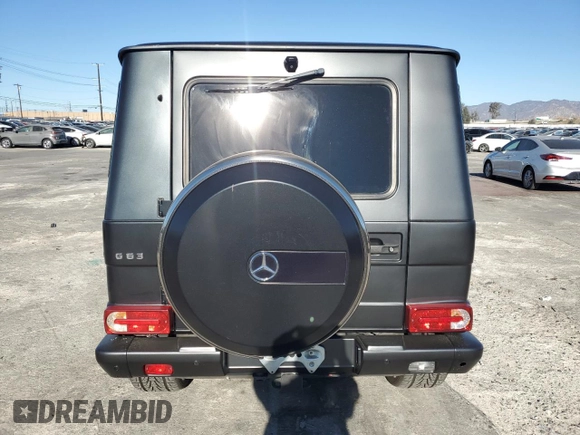 2014 Mercedes-Benz G 63 AMG z VIN WDCYC7DF7EX221315, wystawiony jako Copart lot #88561925 z przebiegiem 81 399 mil mil oraz Szkoda całkowita • Salvage title. Historia ofert i sprzedaży dostępna na DreamBid. Obrazek 6.