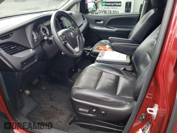 2016 Toyota Sienna SE with VIN 5TDXK3DC6GS737502, listed as a Copart auction lot 57361275 with 110,512 mi miles and Salvage title. Bid and sale history available at DreamBid. Image 7.