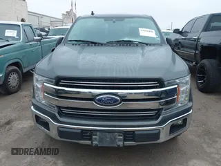 2020 Ford F-150 XL with VIN 1FTEW1C5XLFA97159, listed as a IAAI auction lot 41898490 with 121,674 mi miles and . Bid and sale history available at DreamBid. Image 12.