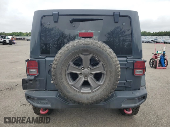 2017 Jeep Wrangler Unlimited Rubicon Recon with VIN 1C4HJWFG3HL729160, listed as a Copart auction lot 64184595 with 78,086 mi miles and Salvage title. Bid and sale history available at DreamBid. Image 6.