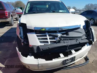 2008 Cadillac Escalade with VIN 1GYEC63818R224347, listed as a IAAI auction lot 41751039 with 240,110 mi miles. Bid and sale history available at carsss.com. Image 6.