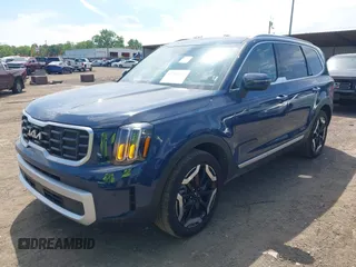 2025 Kia Telluride S with VIN 5XYP64GC6SG581215, listed as a IAAI auction lot 42295271 with 17,941 mi miles and . Bid and sale history available at DreamBid. Image 2.