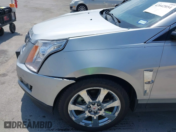 2011 Cadillac SRX Premium Collection with VIN 3GYFNCEY2BS594415, listed as a IAAI auction lot 42042854 with 130,894 mi miles and . Bid and sale history available at DreamBid. Image 6.