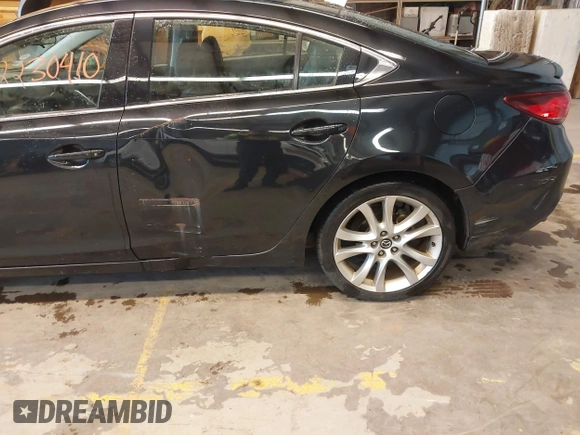 2015 Mazda 6 i Touring with VIN JM1GJ1V6XF1163952, listed as a IAAI auction lot 42230410 with 148,177 mi miles and . Bid and sale history available at carsss.com. Image 6.
