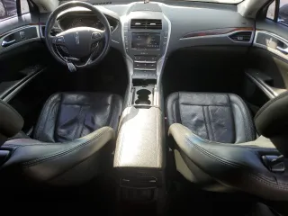 2014 Lincoln MKZ z VIN 3LN6L2JK1ER801584, wystawiony jako Copart lot #49283495 z przebiegiem 93 161 mil mil oraz Szkoda całkowita • Salvage title. Historia ofert i sprzedaży dostępna na DreamBid. Obrazek 8.