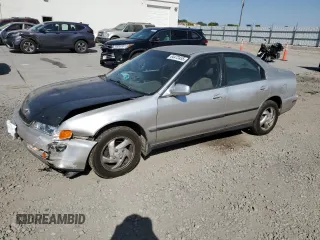 1997 Honda Accord LX with VIN 1HGCD5530VA112866, listed as a Copart auction lot 64472455 with 275,669 mi miles and Salvage title. Bid and sale history available at DreamBid. Image 1.