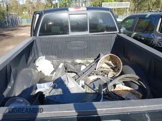 2007 Ford F-150 STX with VIN 1FTRX12W97FB51954, listed as a IAAI auction lot 41977872 with 223,484 mi miles and . Bid and sale history available at DreamBid. Image 12.