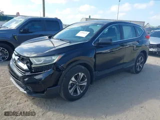 2017 Honda CR-V LX with VIN 7FARW5H33HE001050, listed as a IAAI auction lot 41944571 with 61,159 mi miles. Bid and sale history available at carsss.com. Image 2.