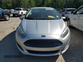 2019 Ford Fiesta SE z VIN 3FADP4BJXKM123806, wystawiony jako Copart lot #53184825 z przebiegiem 141 759 mil mil oraz Szkoda całkowita • Salvage title. Historia ofert i sprzedaży dostępna na DreamBid. Obrazek 5.