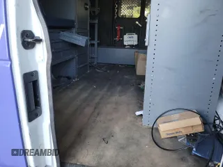 2012 Ford Econoline Cargo Commercial with VIN 1FTNE2EL9CDB21032, listed as a IAAI auction lot 42787135 with 106,406 mi miles and . Bid and sale history available at DreamBid. Image 16.