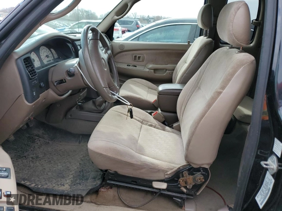 2004 Toyota Tacoma with VIN 5TEWN72N14Z424211, listed as a Copart auction lot 51815615 with 203,415 mi miles and Salvage Title. Bid and sale history available at DreamBid. Image 7.