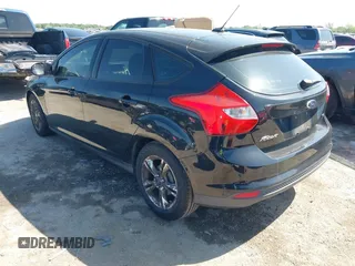 2014 Ford Focus SE with VIN 1FADP3K29EL273107, listed as a IAAI auction lot 42083524 with 140,834 mi miles. Bid and sale history available at carsss.com. Image 3.