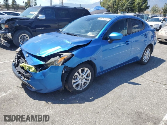 2016 Scion iA z VIN 3MYDLBZV6GY141028, wystawiony jako Copart lot #55264655 z przebiegiem 110 327 mil mil oraz Czysty tytuł • Clean title. Historia ofert i sprzedaży dostępna na DreamBid. Obrazek 1.