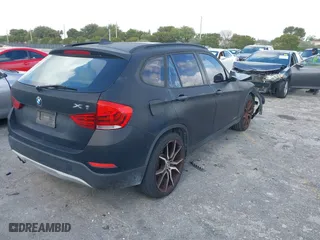 2015 BMW X1 sDrive28i with VIN WBAVM1C56FV314381, listed as a IAAI auction lot 41961245 with 68,182 mi miles. Bid and sale history available at carsss.com. Image 4.