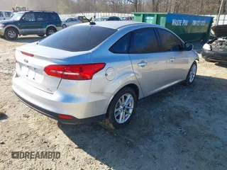 2016 Ford Focus SE with VIN 1FADP3F27GL390830, listed as a IAAI auction lot 41665012 with 119,673 mi miles. Bid and sale history available at carsss.com. Image 4.