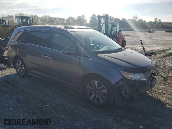 2014 Honda Odyssey Touring z VIN 5FNRL5H90EB007862, wystawiony jako Copart lot #60470005 z przebiegiem 135 686 mil mil oraz Czysty tytuł • Clean title. Historia ofert i sprzedaży dostępna na DreamBid. Obrazek 4.
