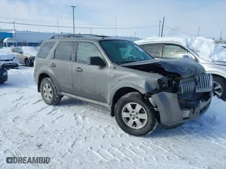 2009 Mercury Mariner with VIN 4M2CU91GX9KJ08073, listed as a IAAI auction lot 41404100 with 90,466 mi miles. Bid and sale history available at carsss.com. Image 1.