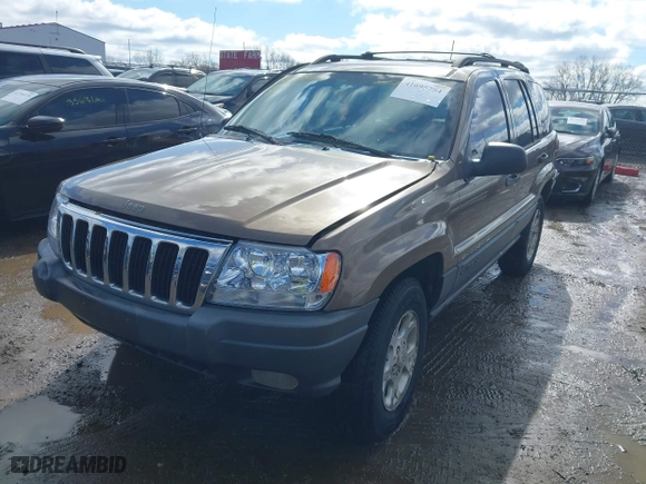 2001 Jeep Grand Cherokee Laredo with VIN 1J4GW48S21C572272, listed as a IAAI auction lot 41695754 with 169,229 mi miles. Bid and sale history available at carsss.com. Image 2.