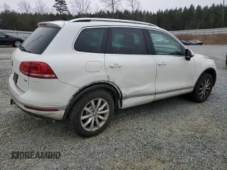 2015 Volkswagen Touareg Lux с VIN WVGEP9BP2FD002247, выставлен на аукционе Copart как лот 41924615 с пробегом 127 543 миль миль и Списание • Salvage title. История ставок и продаж доступна на DreamBid. Изображение 3.