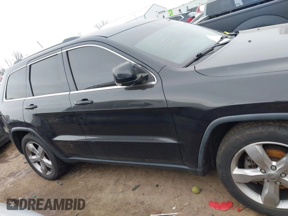 2013 Jeep Grand Cherokee Overland with VIN 1C4RJFCG1DC593890, listed as a IAAI auction lot 41264434 with 204,324 mi miles. Bid and sale history available at carsss.com. Image 12.