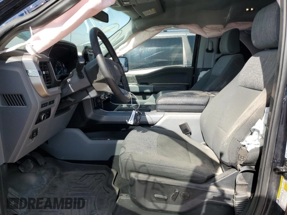 2023 Ford F-150 XL with VIN 1FTFW1E83PFB53217, listed as a Copart auction lot 50497895 with 43,095 mi miles and Salvage Title. Bid and sale history available at carsss.com. Image 7.