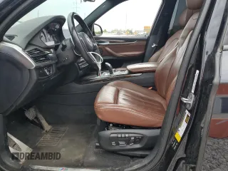 2015 BMW X5 xDrive35i z VIN 5UXKR0C59F0P13587, wystawiony jako Copart lot #57224415 z przebiegiem 155 131 mil mil oraz Szkoda całkowita • Salvage title. Historia ofert i sprzedaży dostępna na DreamBid. Obrazek 7.