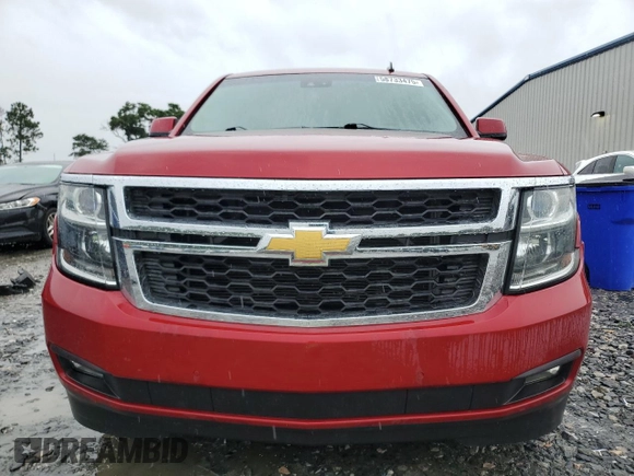 2015 Chevrolet Suburban LT with VIN 1GNSCJKC2FR306223, listed as a Copart auction lot 58733475 with 191,330 mi miles and Salvage title. Bid and sale history available at DreamBid. Image 5.