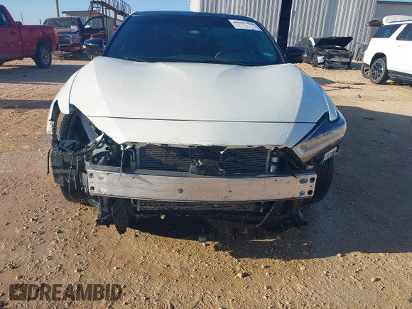 2020 Nissan Maxima SR with VIN 1N4AA6EVXLC365710, listed as a IAAI auction lot 40969464 with 74,320 mi miles and . Bid and sale history available at DreamBid. Image 6.