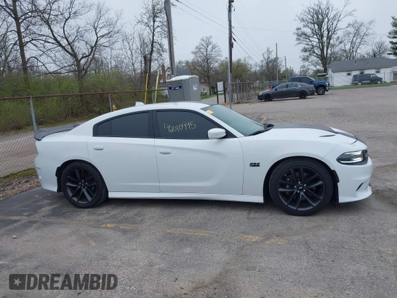 2019 Dodge Charger Scat Pack with VIN 2C3CDXGJXKH635612, listed as a IAAI auction lot 42010995 with 34,860 mi miles and . Bid and sale history available at DreamBid. Image 13.