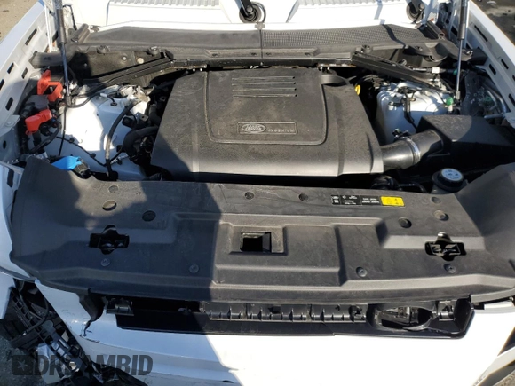 2023 Land Rover Defender S with VIN SALEJ6EX6P2147281, listed as a Copart auction lot 84217414 with 27,758 mi miles and Salvage title. Bid and sale history available at DreamBid. Image 12.