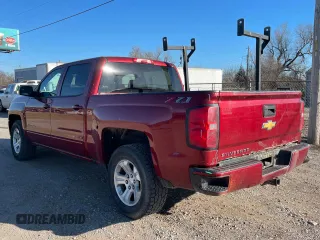 2018 Chevrolet Silverado 1500 LT with VIN 3GCUKRECXJG257926, listed as a Copart auction lot 47128405 with 272,996 mi miles and Clean Title. Bid and sale history available at carsss.com. Image 3.
