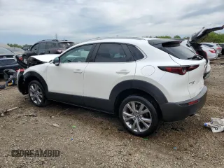 2023 Mazda CX-30 S Select with VIN 3MVDMBBM2PM555443, listed as a Copart auction lot 58159865 with 30,118 mi miles and Salvage title. Bid and sale history available at DreamBid. Image 2.
