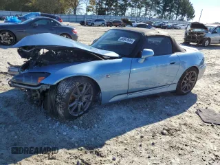 2004 Honda S2000 with VIN JHMAP21434T001949, listed as a Copart auction lot 80947694 with Not Provided miles and Salvage Title. Bid and sale history available at DreamBid. Image 1.