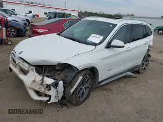 2018 BMW X1 xDrive28i with VIN WBXHT3C31J5K22765, listed as a IAAI auction lot 41800397 with 110,205 mi miles and . Bid and sale history available at DreamBid. Image 2.