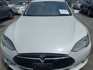 2016 Tesla Model S 90D with VIN 5YJSA1E40GF123543, listed as a IAAI auction lot 42111603 with 126,445 mi miles and . Bid and sale history available at DreamBid. Image 10.