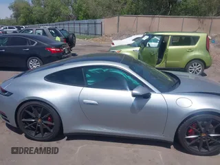 2020 Porsche 911 Carrera S z VIN WP0AB2A90LS229570, wystawiony jako IAAI lot #42242278 z przebiegiem 15 967 mil mil oraz . Historia ofert i sprzedaży dostępna na DreamBid. Obrazek 13.