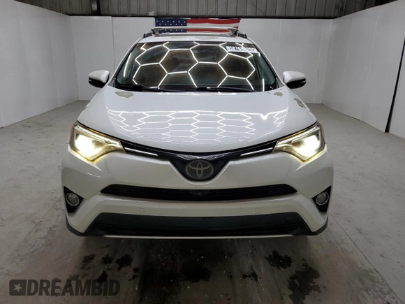 2016 Toyota RAV4 Limited with VIN 2T3YFREV3GW293988, listed as a Copart auction lot 58768425 with 140,214 mi miles and Clean title. Bid and sale history available at DreamBid. Image 5.