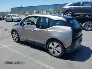 2014 BMW i3 with VIN WBY1Z4C56EV276183, listed as a IAAI auction lot 42345866 with 102,934 mi miles and . Bid and sale history available at DreamBid. Image 3.