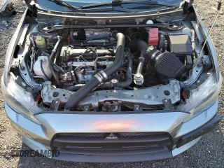 2014 Mitsubishi Lancer Evolution GSR z VIN JA32W8FV6EU018171, wystawiony jako Copart lot #77109934 z przebiegiem 83 467 mil mil oraz Tytuł czysty. Historia ofert i sprzedaży dostępna na DreamBid. Obrazek 11.