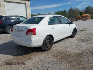 2009 Toyota Yaris with VIN JTDBT903991303431, listed as a IAAI auction lot 41794505 with 183,917 mi miles. Bid and sale history available at carsss.com. Image 4.