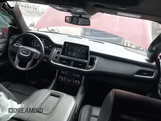2023 GMC Yukon XL SLT z VIN 1GKS2GKDXPR314163, wystawiony jako IAAI lot #41716933 z przebiegiem 42 963 mil mil oraz . Historia ofert i sprzedaży dostępna na DreamBid. Obrazek 5.