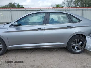2024 Volkswagen Jetta SE z VIN 3VW7M7BU9RM012652, wystawiony jako IAAI lot #41911472 z przebiegiem 47 151 mil mil oraz . Historia ofert i sprzedaży dostępna na DreamBid. Obrazek 14.